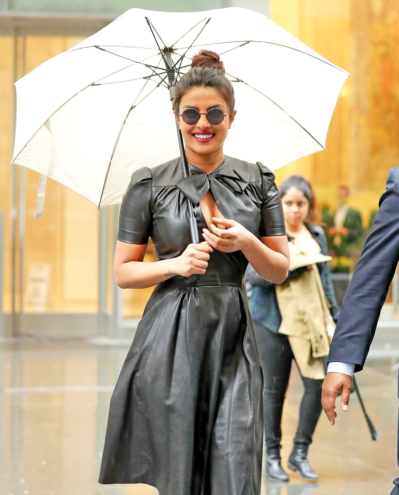 Priyanka Chopra Displayed Her Sexy Cleavage in a Black Leather Dress as She Was Out on a Rainy Day in New York City