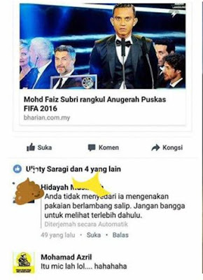 Faiz subri pakai baju lambang salib