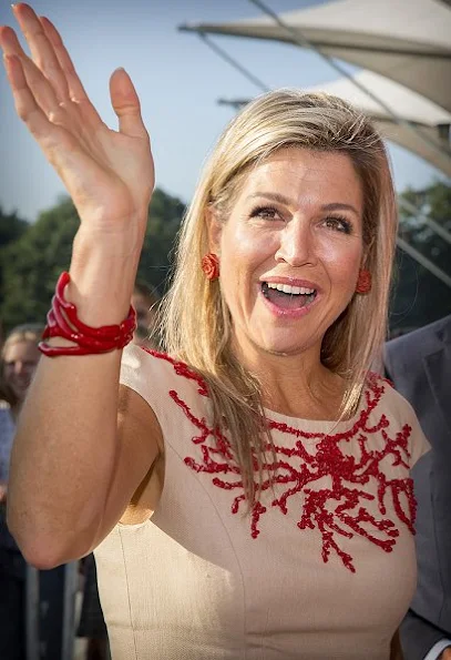 Queen Maxima of The Netherlands  visited ROC School  of Amsterdam. Queen Maxima wore Natan dress, and Natan shoes, pumps, dress new sesion