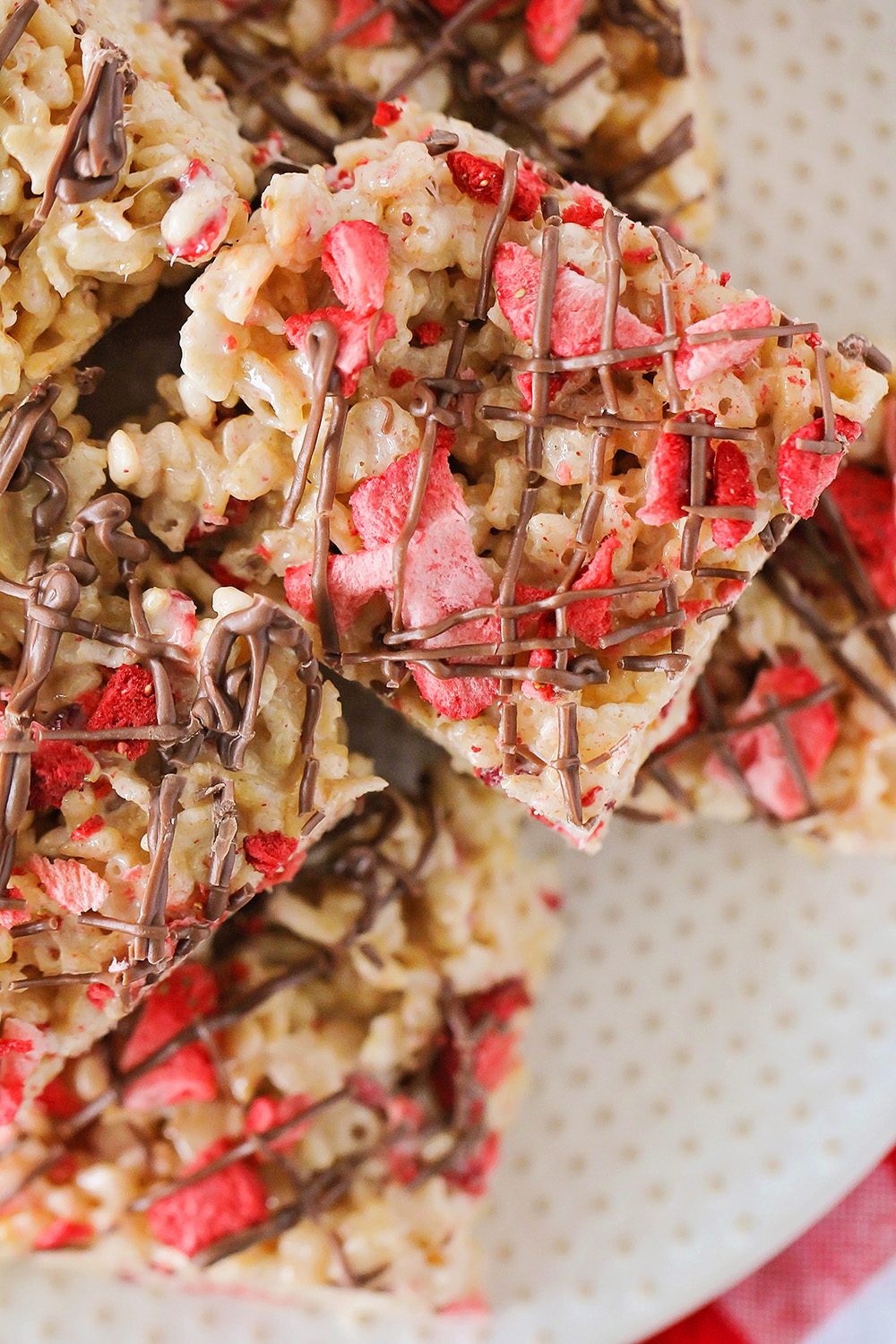 These strawberry chocolate rice krispy treats are loaded with sweet strawberry flavor and a touch of chocolate, for an amazingly delicious treat!