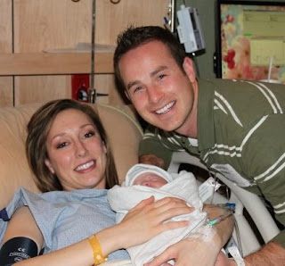 Jordan and Bubba holding baby boy, from Fun Cheap or Free