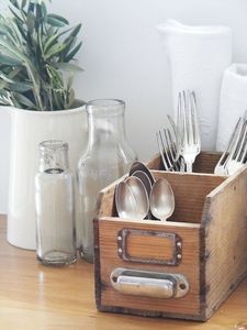 These small wooden drawers are great for storing silverware. 
