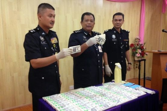 nigerian fraudster arrested malaysia