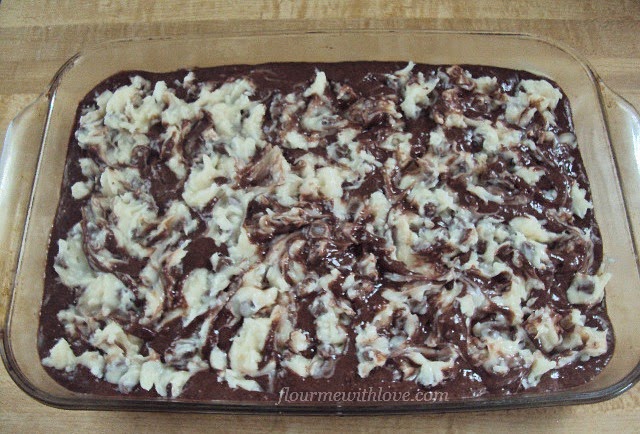 Chocolate fudge, cream cheese, coconut and chocolate chips blended into one delicious cake!