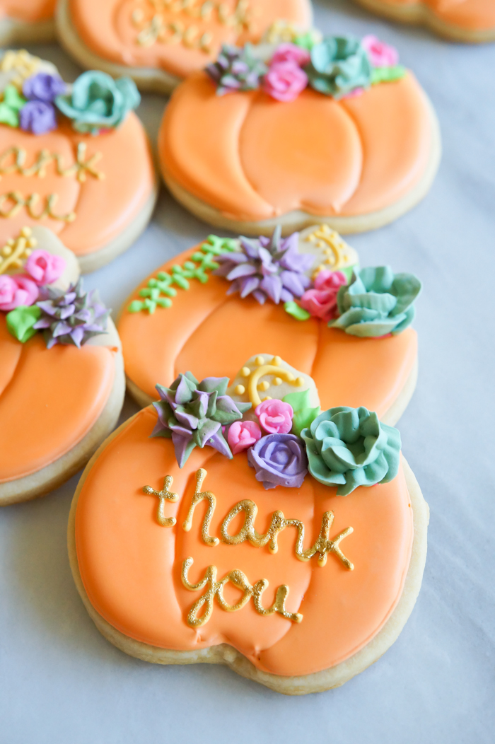 decorated pumpkin cookies with royal icing succulents and roses | bakeat350.net