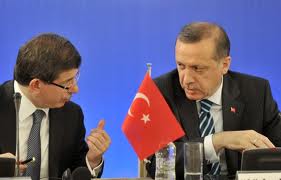 Ahmet Davutoglu (L) with Recep Erdogan (R)