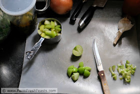 coring tomatillos to make salsa verde with roasted hatch chiles 