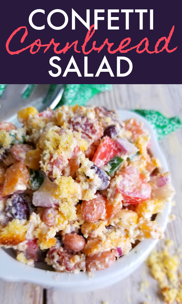 Confetti Cornbread Salad | A kaleidoscope of crisp bacon and diced fresh vegetables, creamy beans and shredded cheese tossed with sour cream dressing and crumbled cornbread in a bright, beautiful, fun salad perfect for potlucks, picnics and Sunday dinner. #recipe #cornbread #salad #confetti