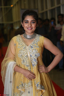 Nivetha Thamos in bright yellow dress at Ninnu Kori pre release function ~  Exclusive (8)
