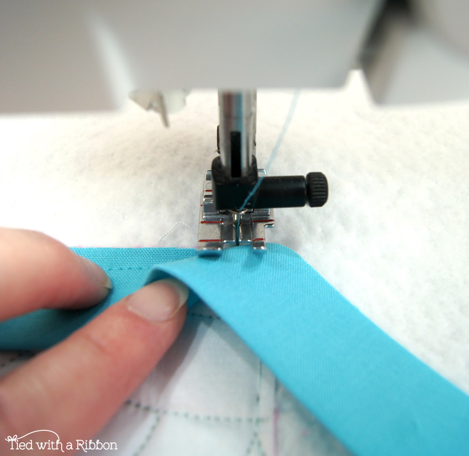 Tied with a Ribbon How to sew your Quilt Binding continuously around the corner Tutorial
