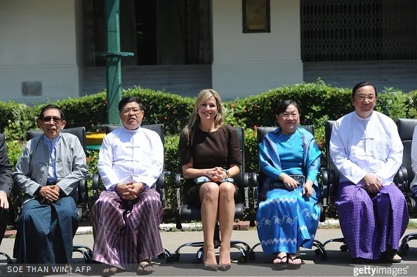 Queen Maxima of the Netherlands with officials and professors at Yangon University in Yangon
