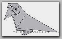 Bước 14: Vẽ mắt để hoàn thành cách xếp con quạ bằng giấy theo phong cách origami.