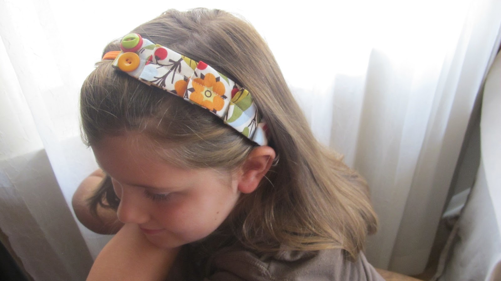 Its Tommy's Time: Orange, green, and brown headband (size child-adult)