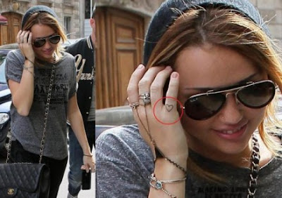 http://2.bp.blogspot.com/-QuWKuOzfv3k/TcT9xzow5TI/AAAAAAAABF0/4UH3SkBl-7Y/s400/miley%2Bcyrus%2Btattoo%2B4.jpg