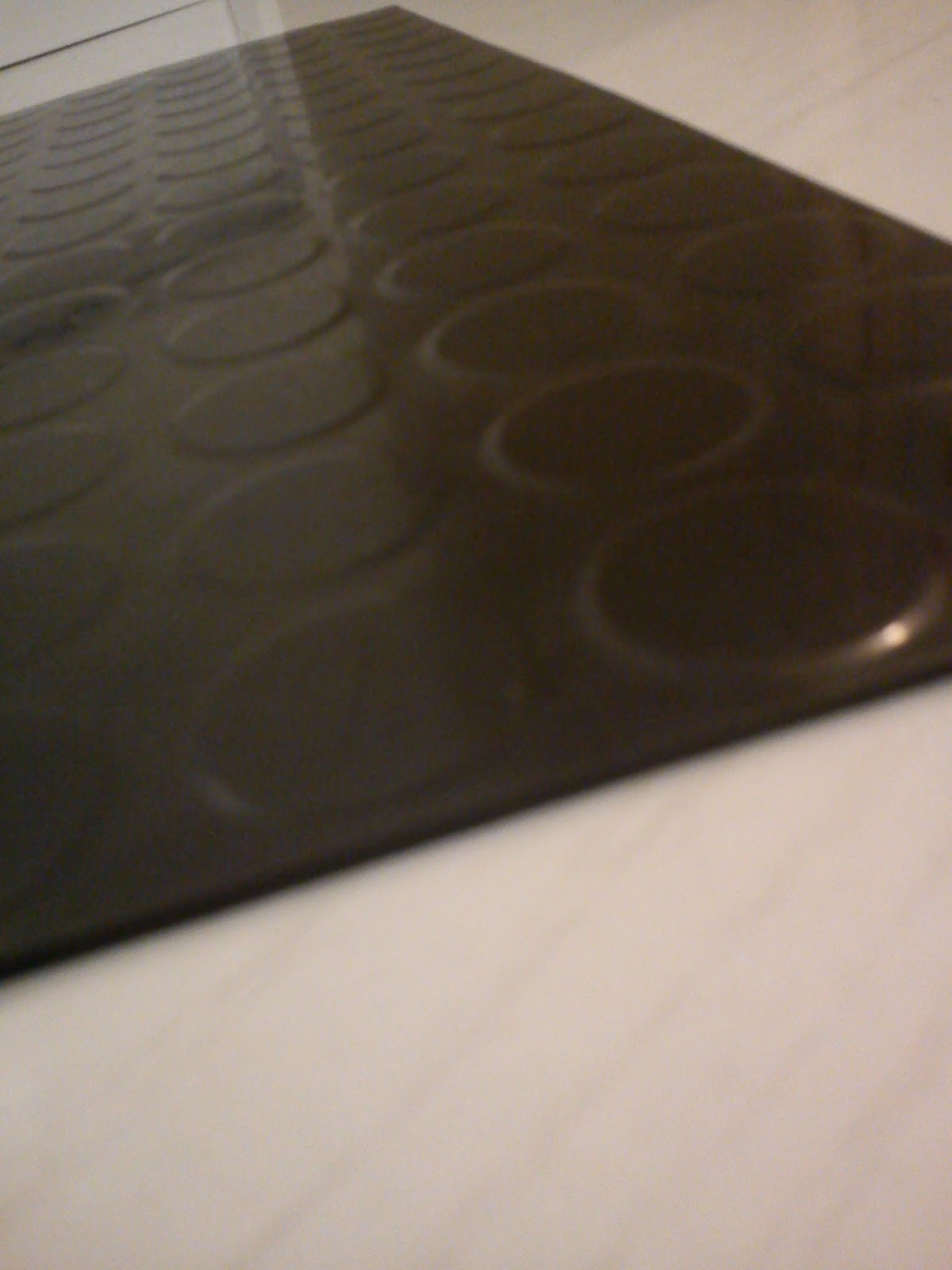 Ymmeli Rubber flooring as backsplash......