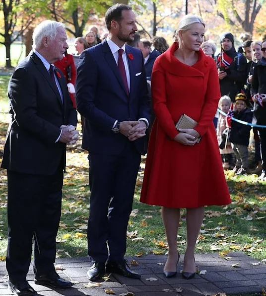 Crown Princess Mette-Marit wore Alexander Mcqueen Dress Coat, Gianvito Rossi pumps, clutch bag, pearl gold earrings