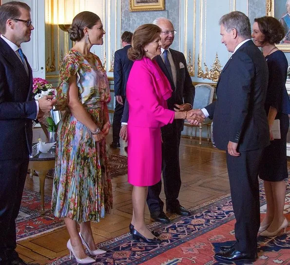 Crown Princess Victoria wore a specially designed dress by Swedish fashion designer Jennifer Blom. Queen Silvia