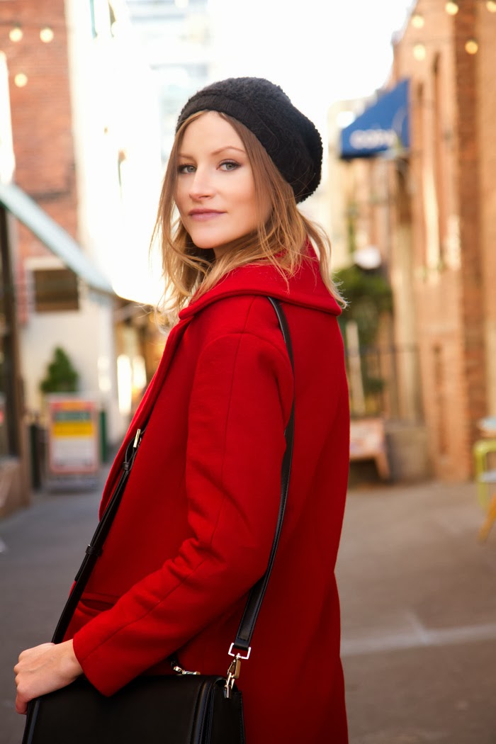 Fashion Blogger, Alison Hutchinson is wearing a red zara coat, rich & skinny slouchy skinnies, a white witchery tee, zara black pumps, a kate spade carrol park penelope bag, and a michael kors watch
