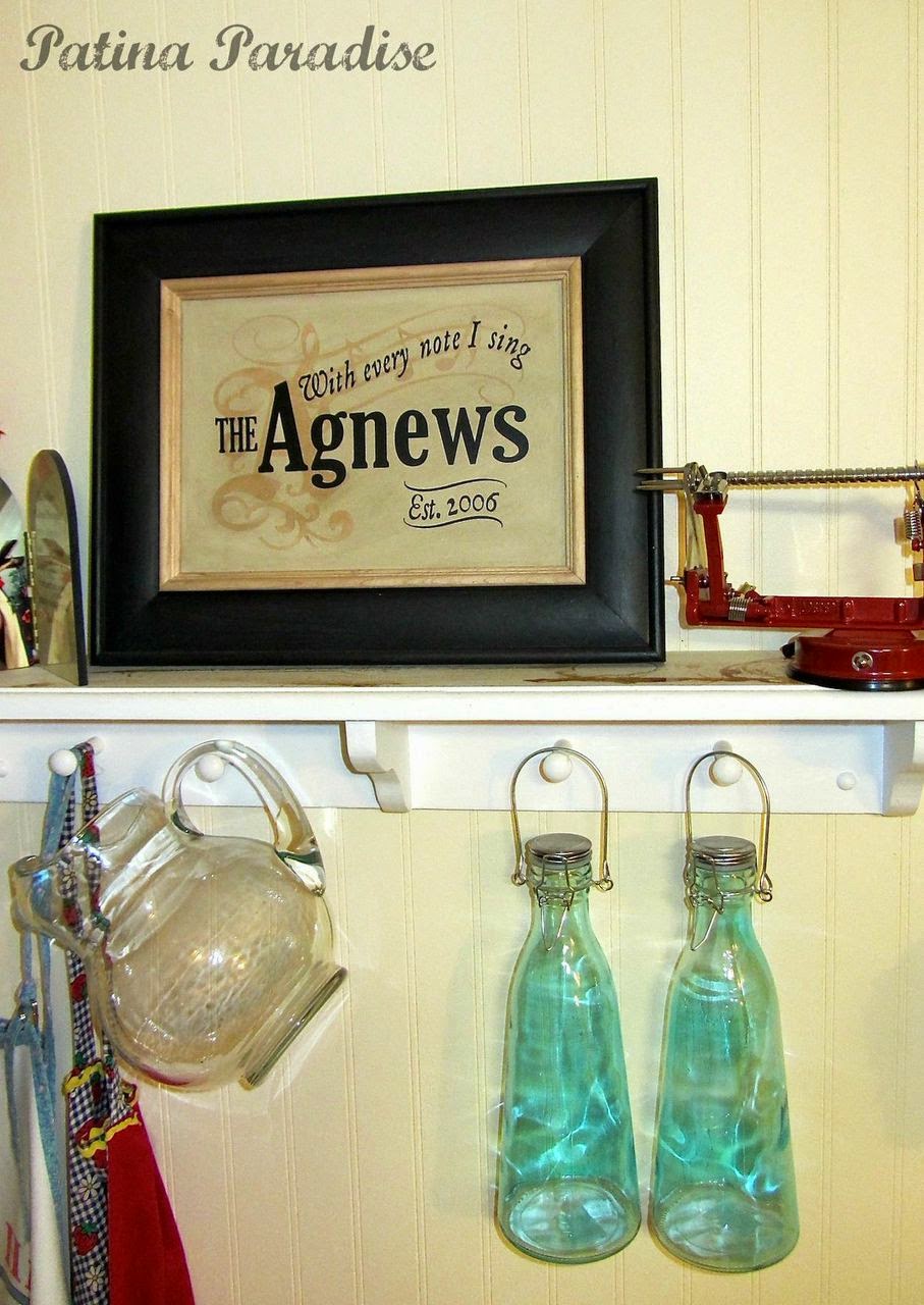 The Agnews have the cabinet door displayed in their kitchen