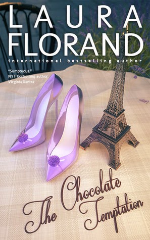 A pair of glass slippers and a miniature of the Eiffel Tower on top of a table.