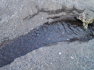 Top View Of Very Small Water Creek Splitting Sand At Umeanyar Beach, North Bali, Indonesia