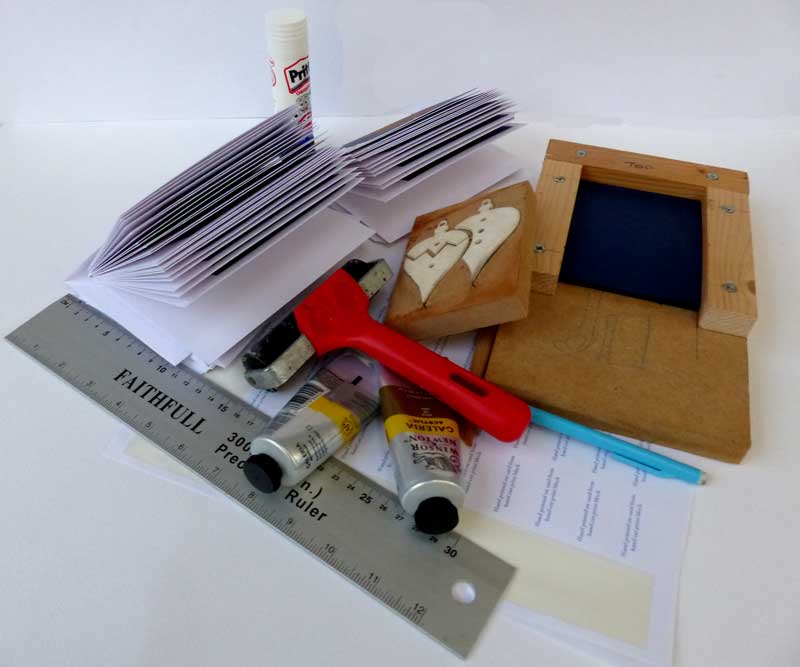 Charlton Stitcher Printing Cards together