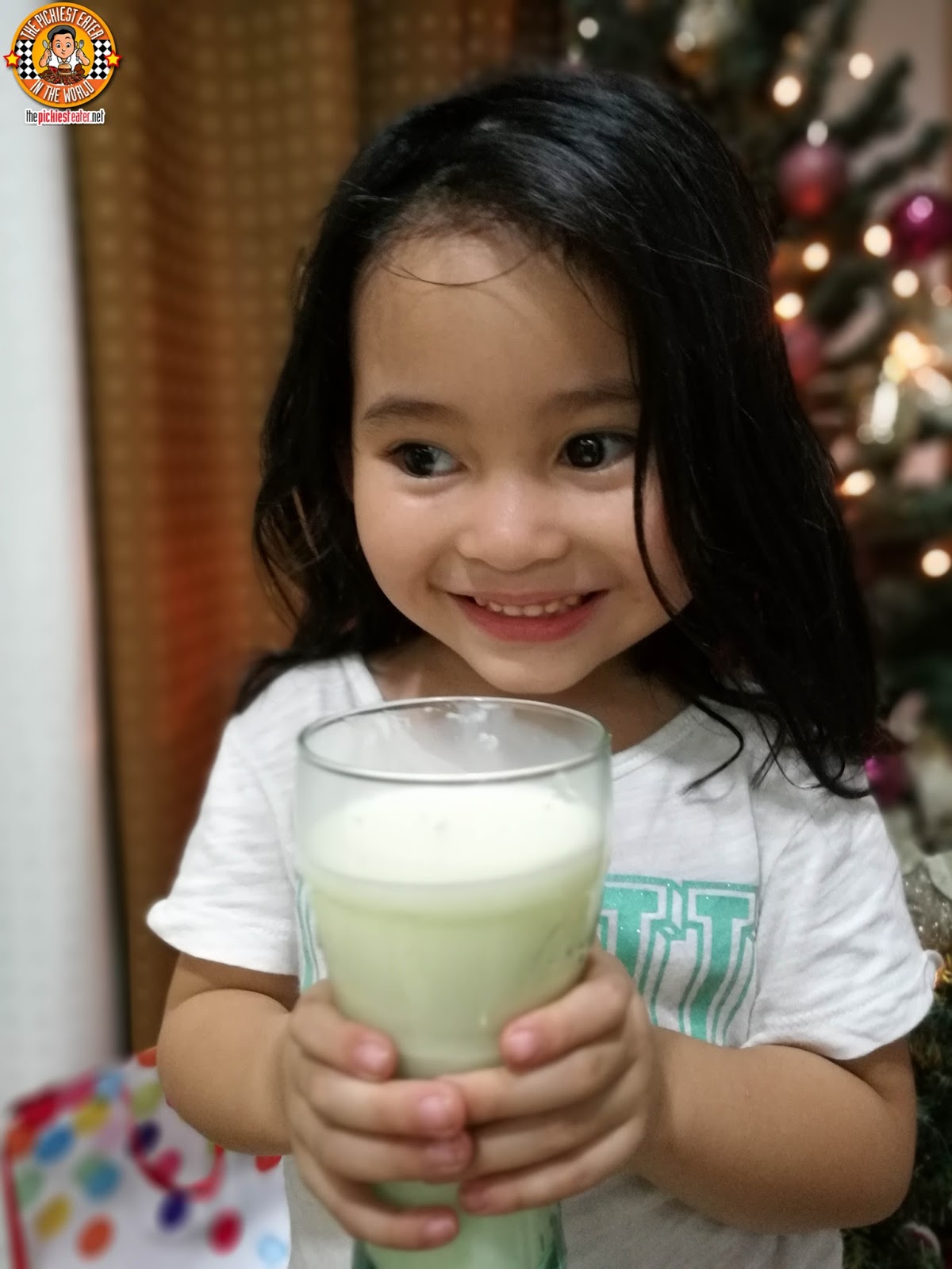 THE PICKIEST EATER IN THE WORLD HAPPINESS IS A GLASS OF ALASKA MILK!