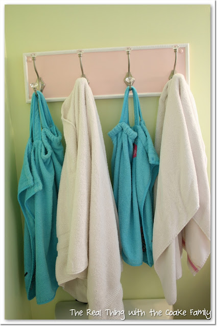 This DIY bathroom towel rack is so inexpensive and easy to make. It will look great in my bathroom or entry hallway and help keep us organized along with maximizing our hanging space. 