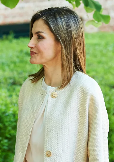Queen Letizia  attends the annual meeting of the board of the student residence at Student Residence (Residencia de Estudiantes). Queen Letizia wears Massimo Dutti Textured Weave Linen Coat