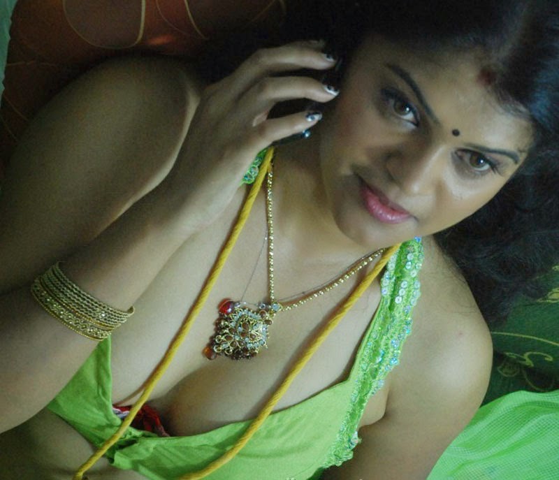 South indian actress show her boobs cleavages.