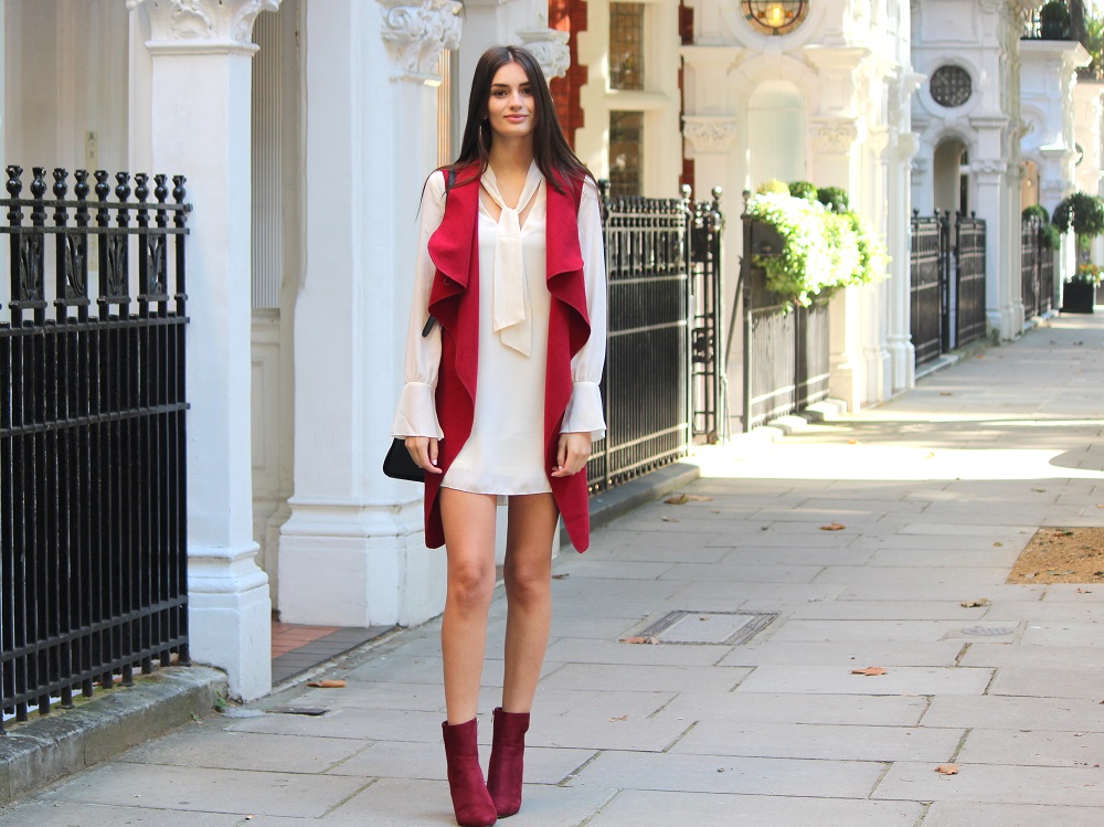 peexo fashion blogger wearing 70s skinny scarf dress and waterfall waistcoat and burgundy suede boots