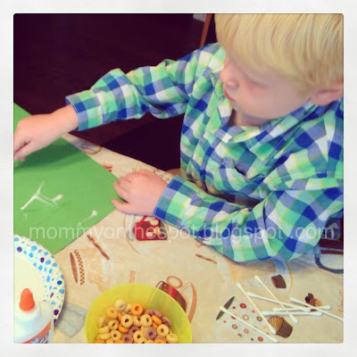 Pinterest craft practicing handwriting with glue and fruit loops