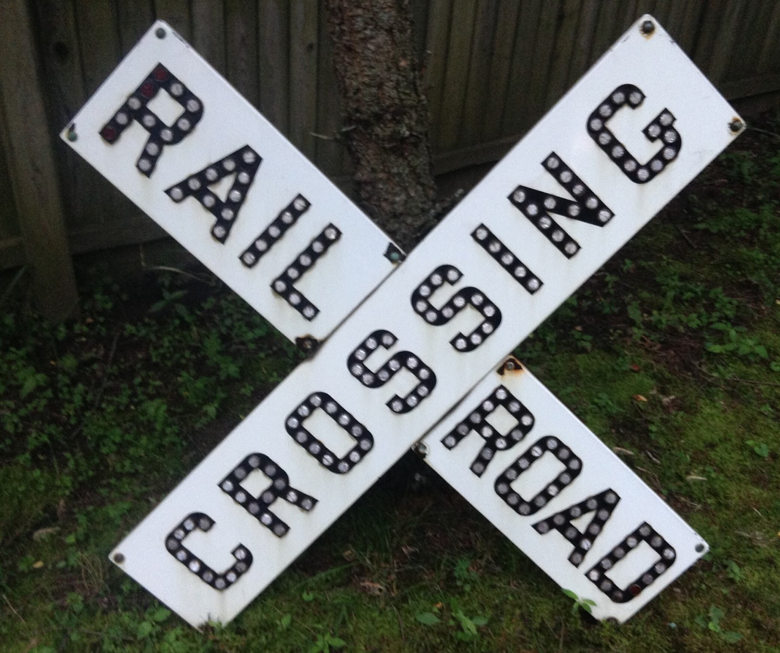 Money in the Garage A railroad crossing sign find