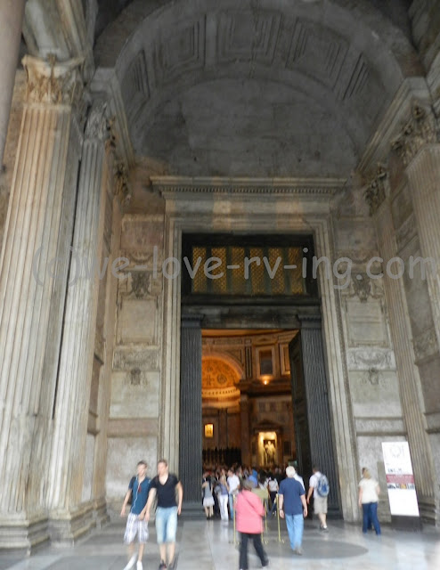 The open doors of the Pantheon welcome us inside