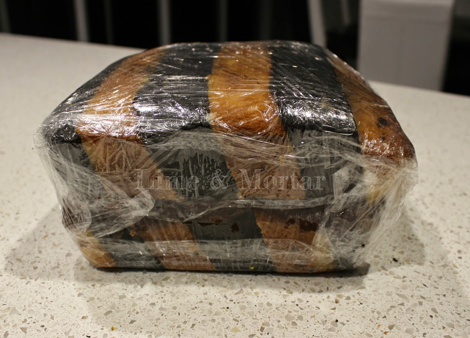 Lime & Mortar Caution Tape Cake Tutorial