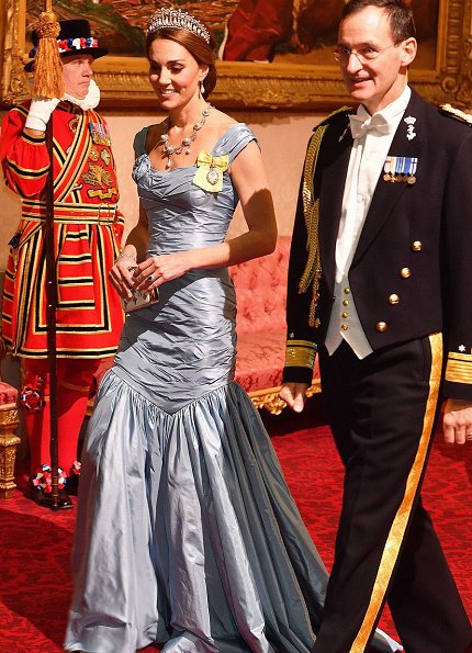 Kate Middleton's wearing the Lovers Knot Tiara, Diana's Collingwood earrings and blue McQueen gown. Maxima' Jan Taminiau gown and pearl tiara