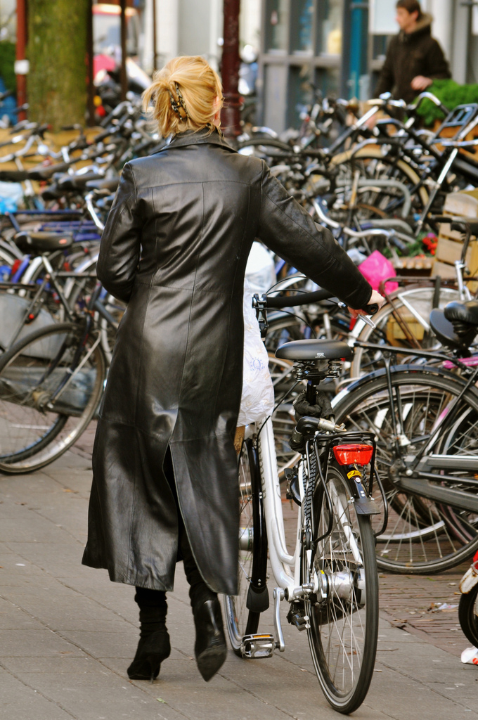 Leather Coat Daydreams: Riding a bicycle in a long leather coat