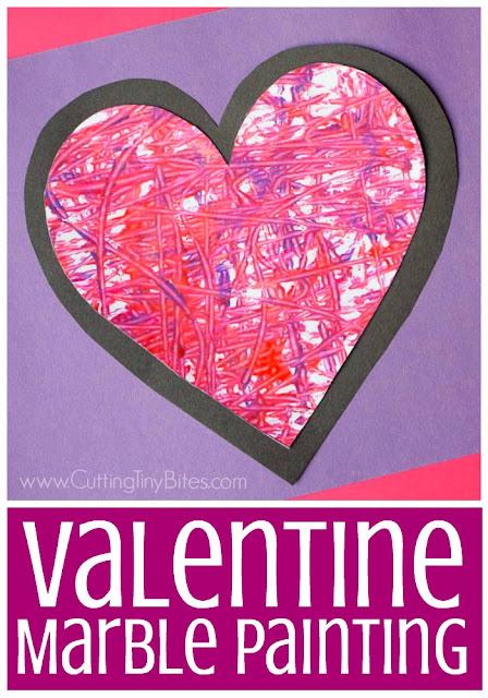 Valentine's Day Marble Painted Hearts and Valentine Garland- fun and easy painting process art activity for Valentine's Day. Great for preschool, kindergarten, or elementary kids. Leave as is or string into a pretty garland for decoration!