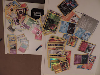 pokemon cards collection and nerf darts