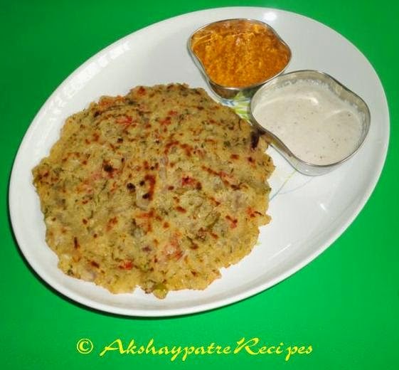 rava uttapa with chutney in a serving plate