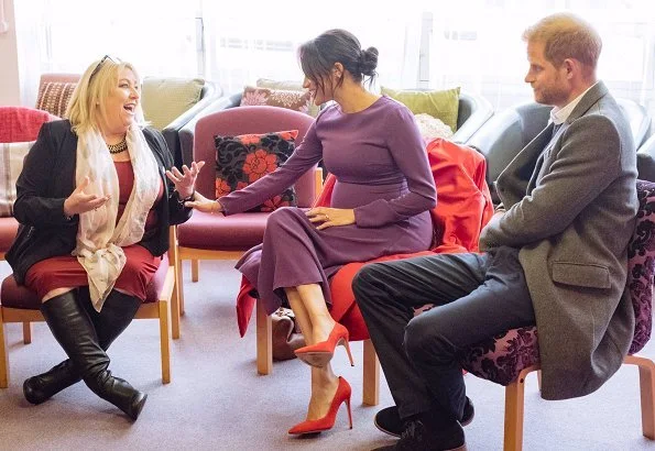 Meghan Markle wore ARITZIA Babaton Maxwell dress, and Sentaler coat, Stuart Weitzman suede pumps, Gabriela Hearst Demi bag