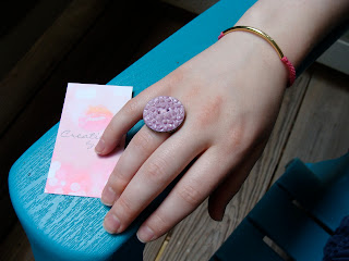 pink braided bracelet and lavender cabochon button ring