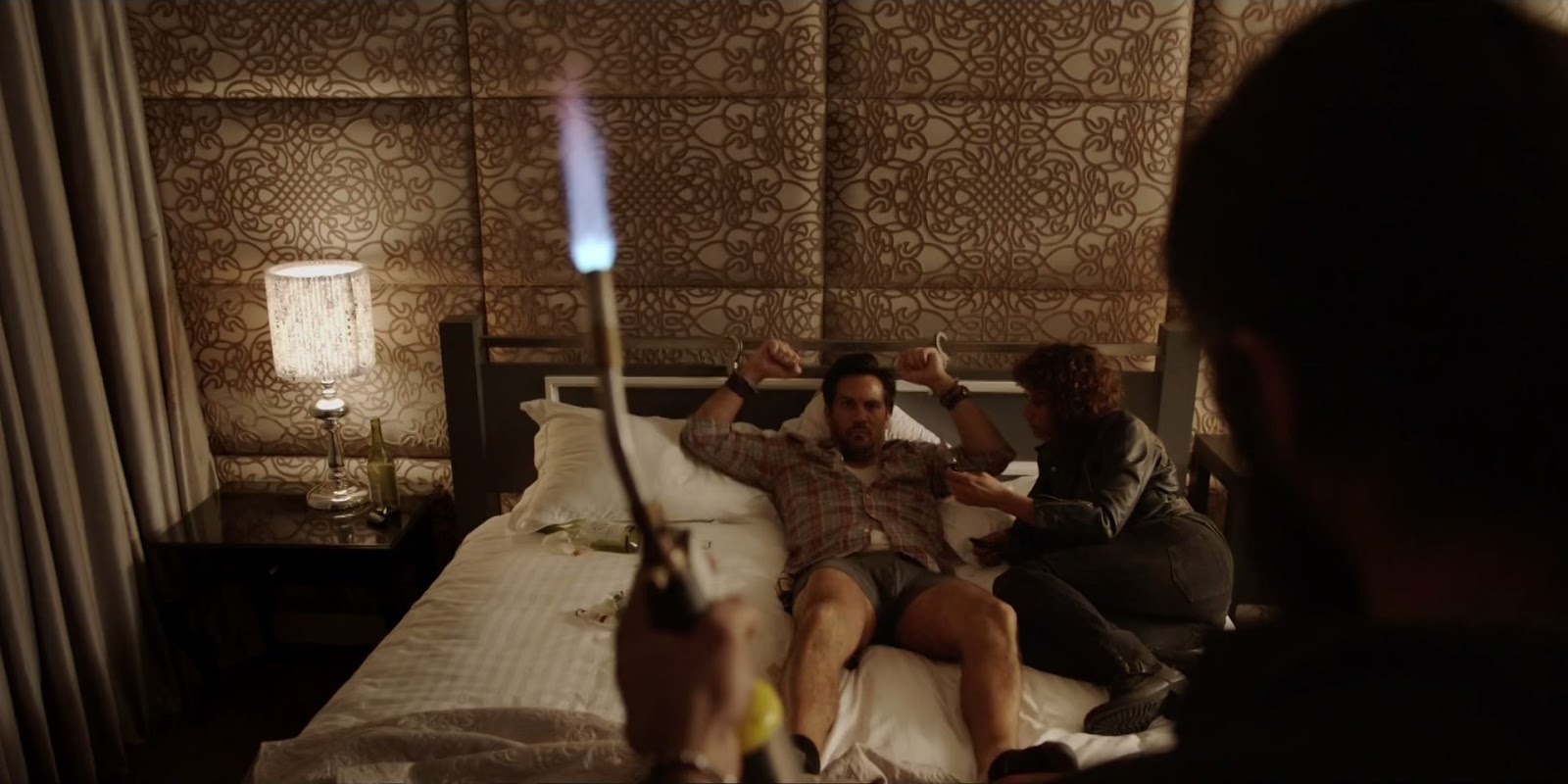 Man Tied To Bed