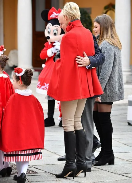 Princess Charlene, Prince Albert II, Louis Ducruet and Camille Gottlieb gave Christmas gifts to refugee children