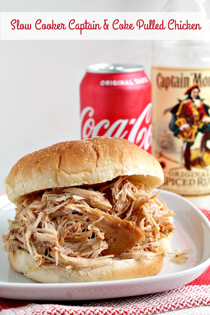 A classic cocktail is transformed into a delicious slow cooker meal that is perfect for game day (or any day!) in this Slow Cooker Captain & Coke Pulled Chicken recipe.