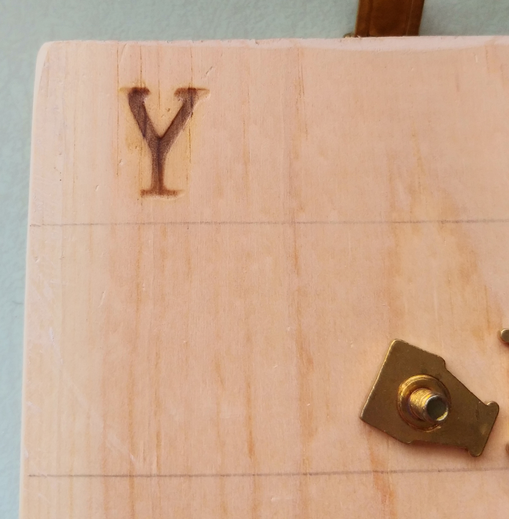 Wood burning with alphabet tips