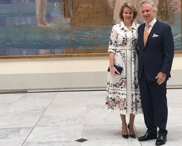 During her visit to the Old Masters Museum, Queen Mathilde wore a new floral print cotton shirt dress by Erdem