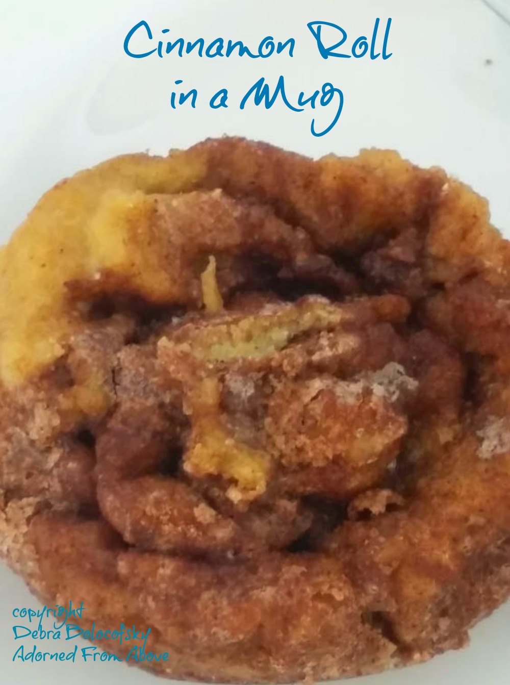 Adorned From Above Cinnamon Roll in a Mug Keto