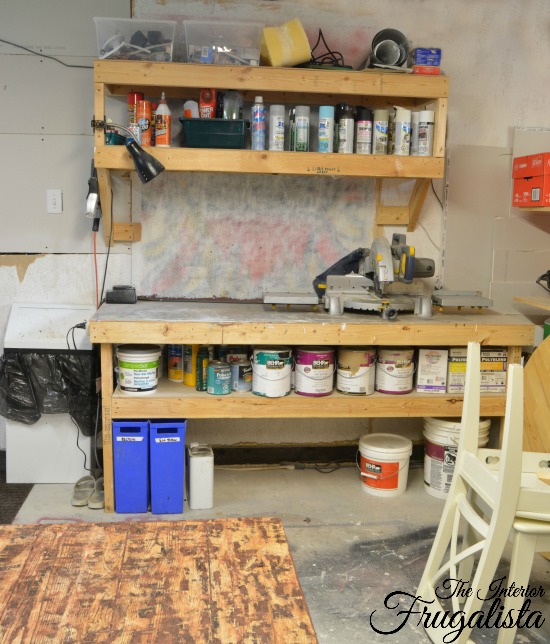 Easy DIY basement workshop workbenches with shelving.