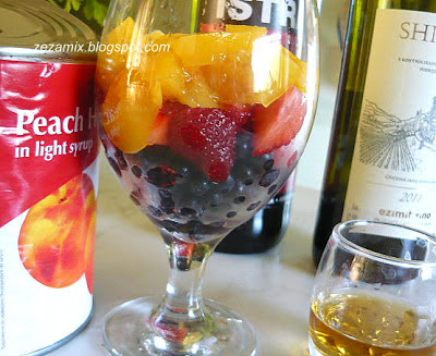 summer cocktail of fruit, rum and wine